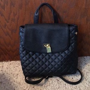 Steve Madden black and gold quilted backpack